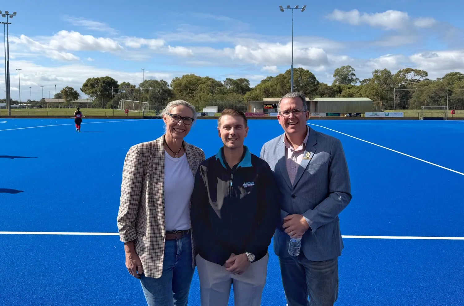 Lisa Munday, Dean Adams-Godfrey and Daniel Wilkins standing together.